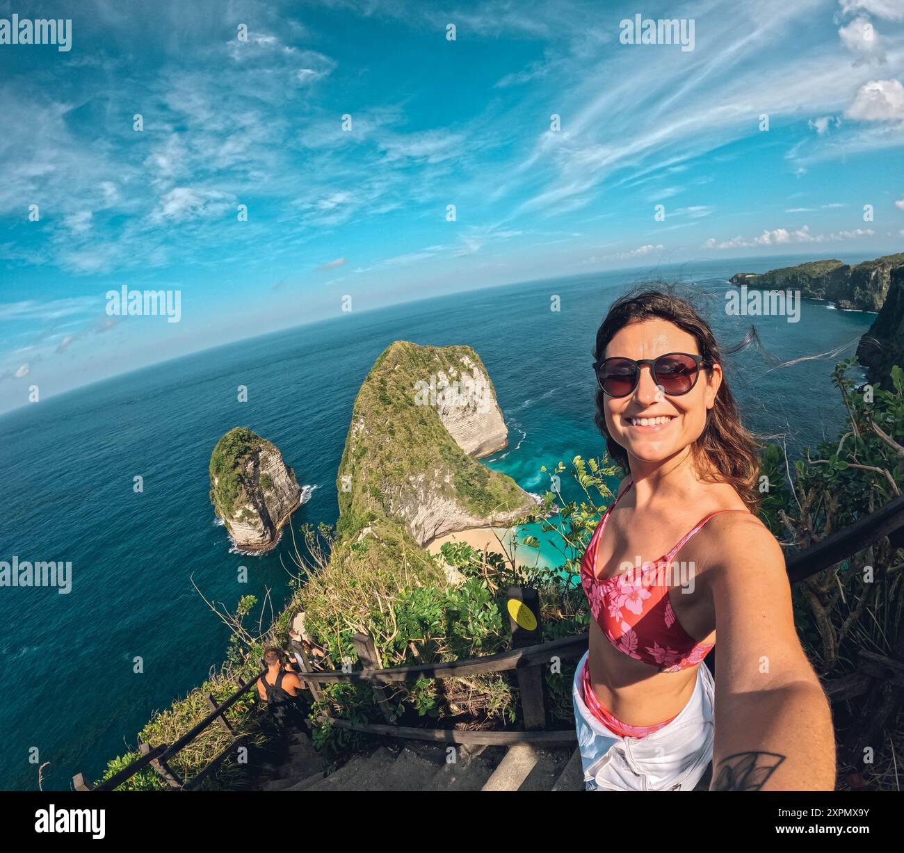 Woman in red bikini wearing hi-res stock photography and images - Alamy