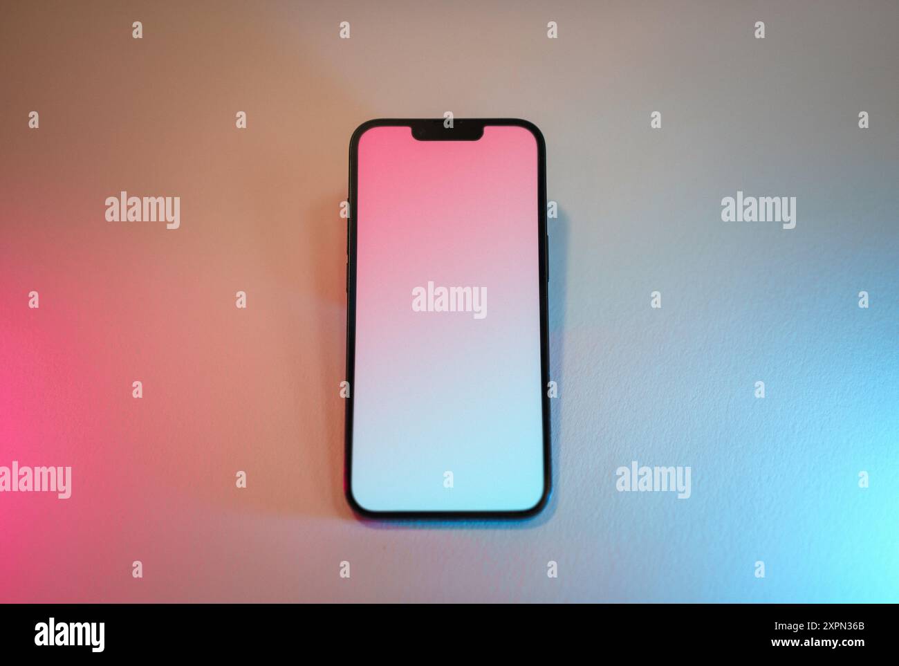 Smartphone blank screen mockup. Pastel light. White textured gradient background Stock Photo