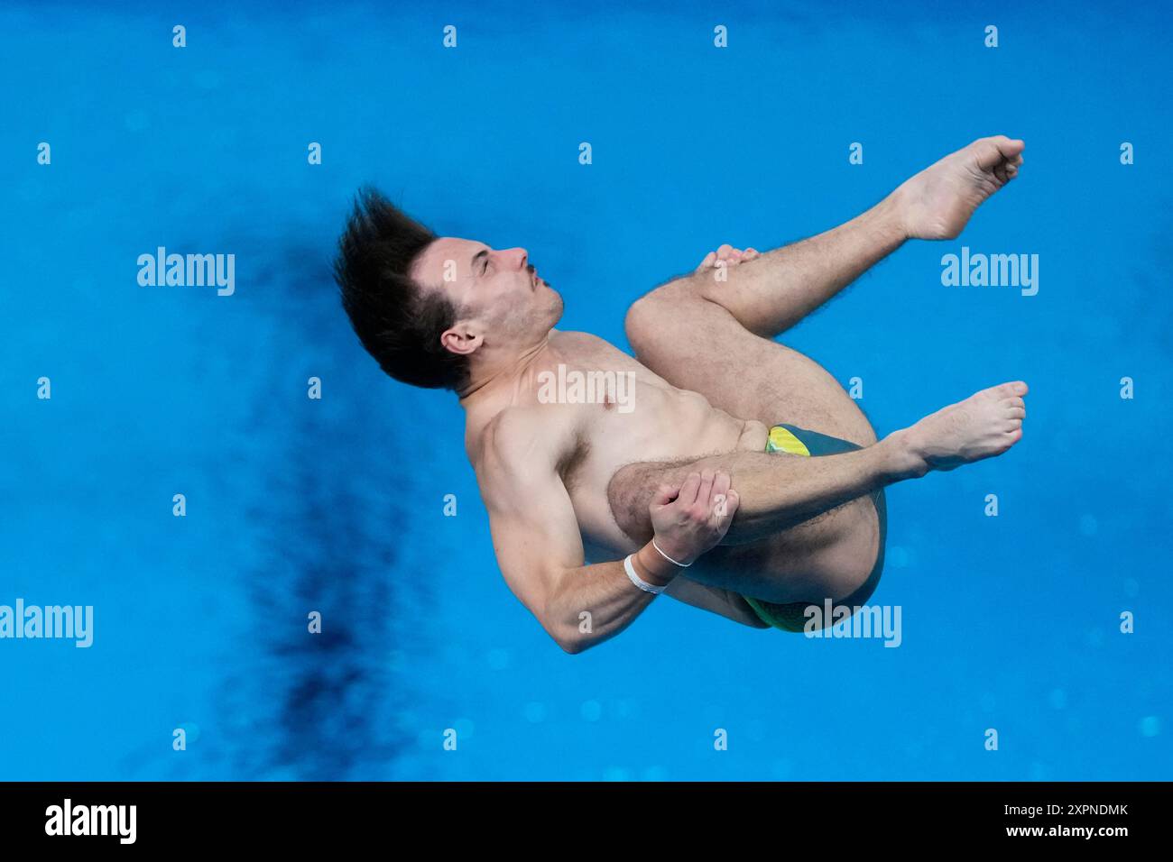 Australia's Kurtis Mathews competes in the men's 3m springboard diving