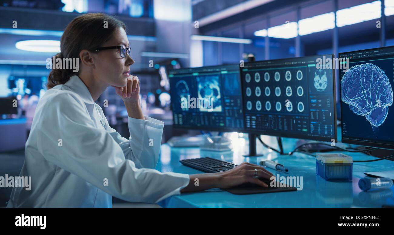 Hospital Research Laboratory: Female Medical Scientist Using Computer ...
