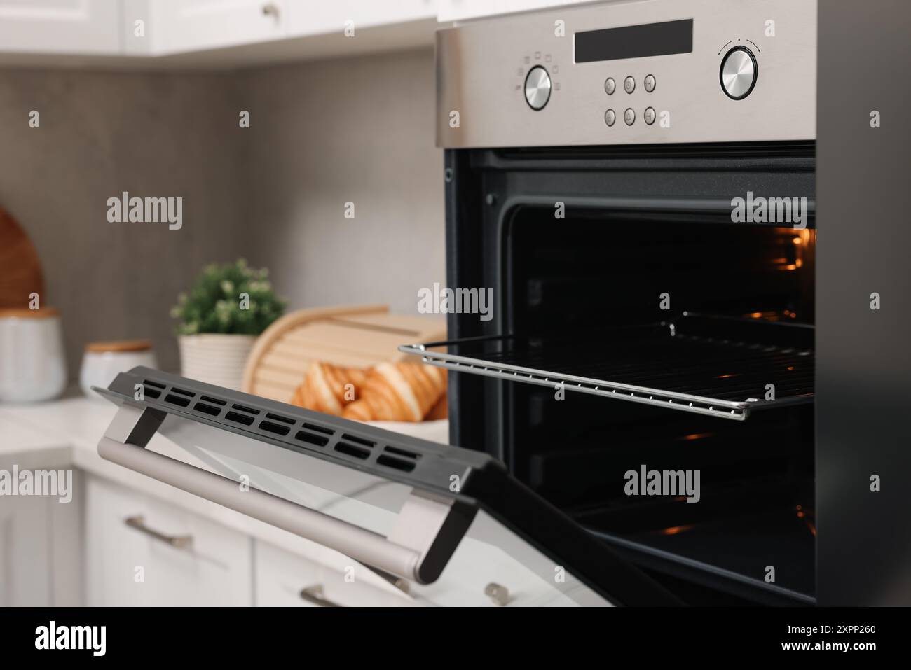 Open electric oven croissants hi-res stock photography and images - Alamy