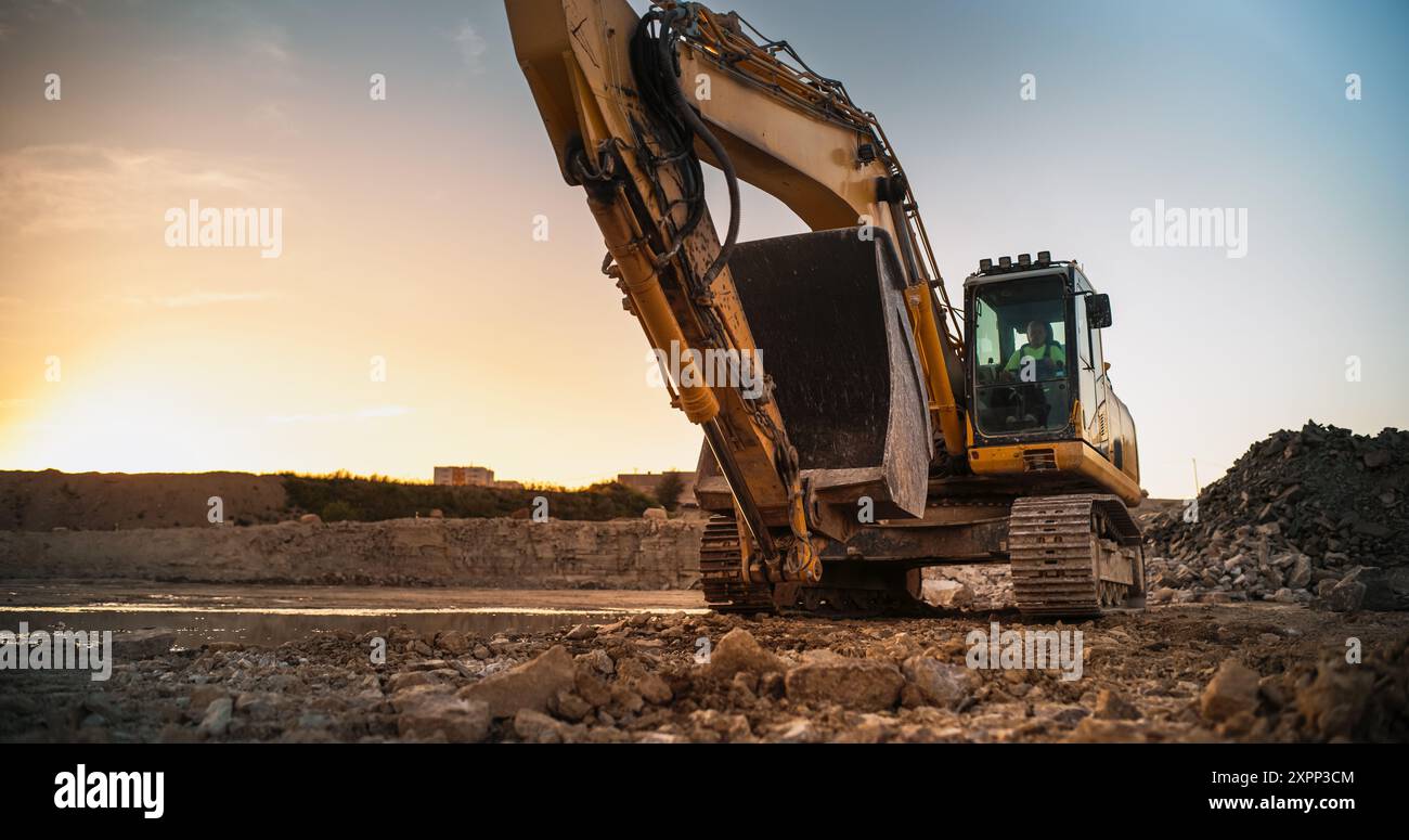 Construction Site On Sunny Evening: Industrial Excavator Driving To ...