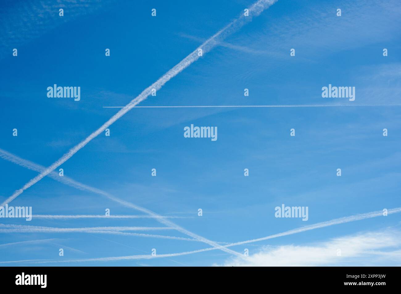 Condensation trails in blue hi-res stock photography and images - Alamy