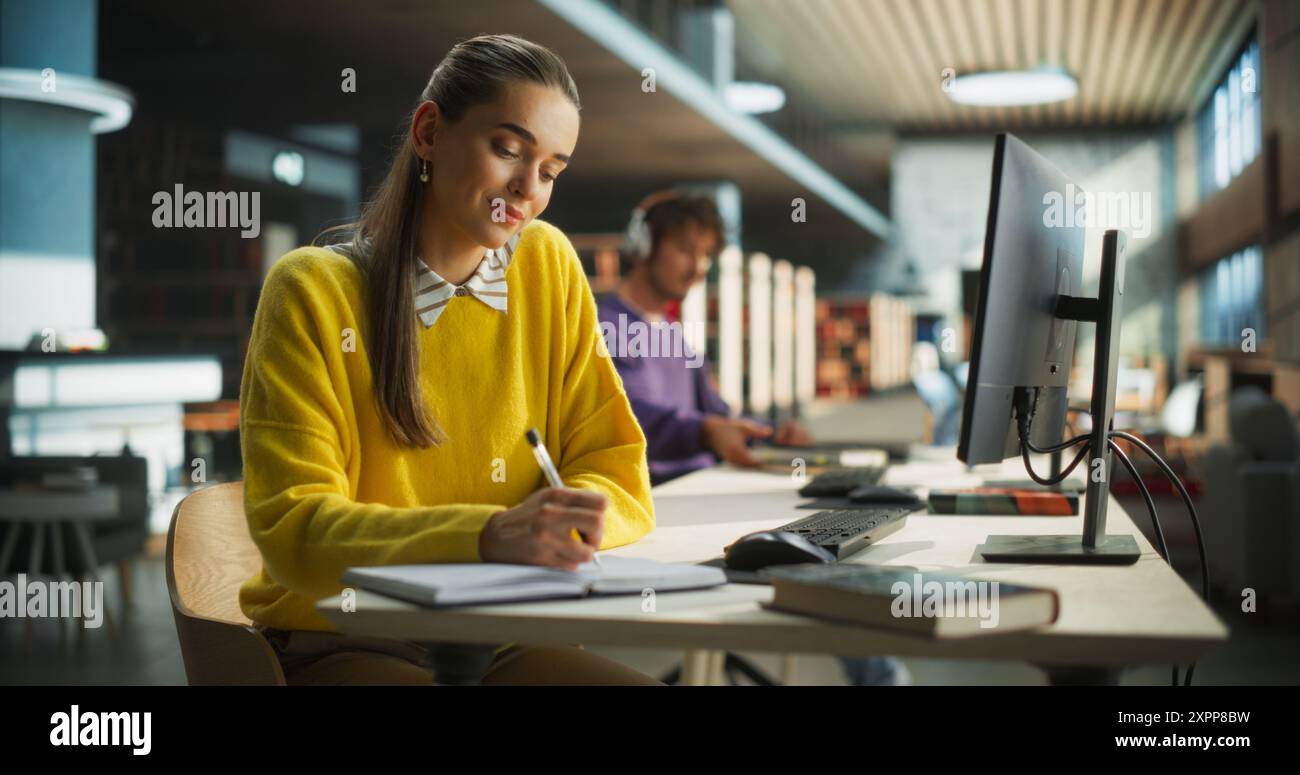 Student writing paper computer hi-res stock photography and images - Alamy