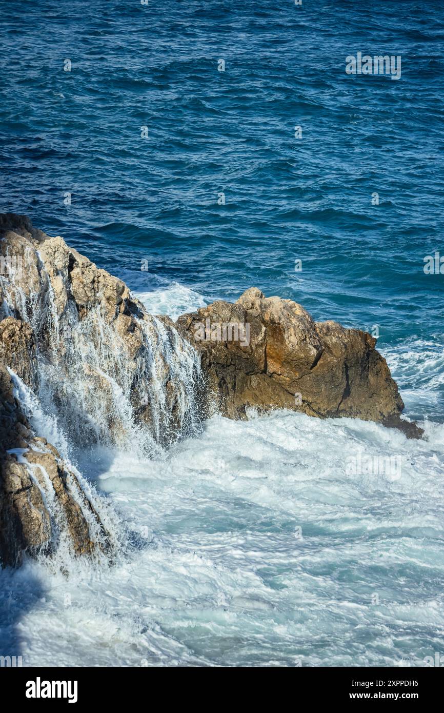 Mediterranean Rocks Rocks in the Mediterranean in Monaco Stock Photo - Alamy
