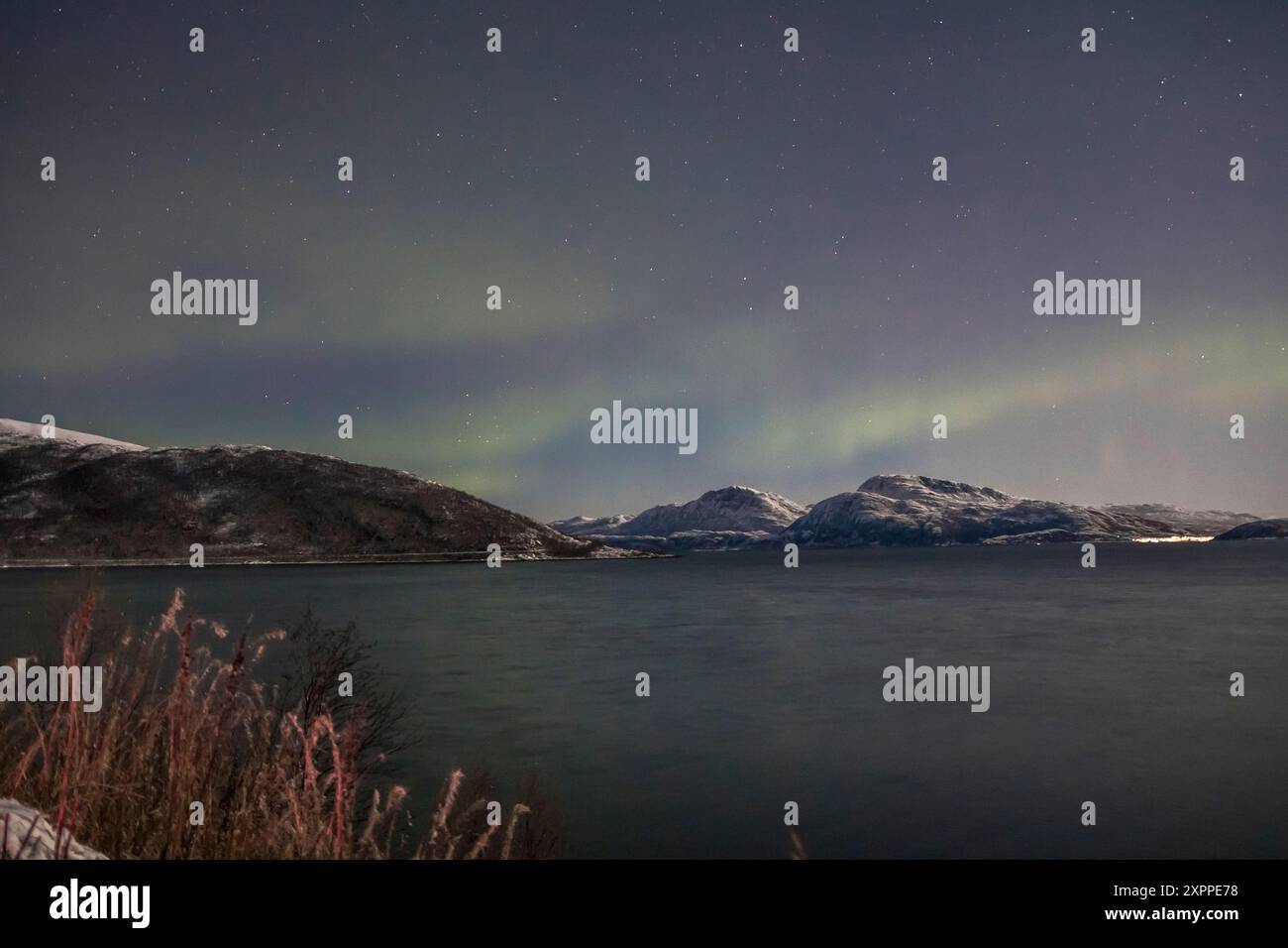 Aurora borealis or Northern lights in the sky over Tromso - Norway ...