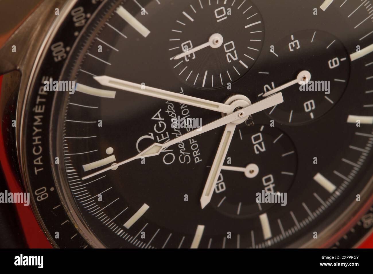 Milan, Italy - August 5, 2024: close up on a classic Omega Speedmaster Moonwatch luxury timepiece. Stock Photo