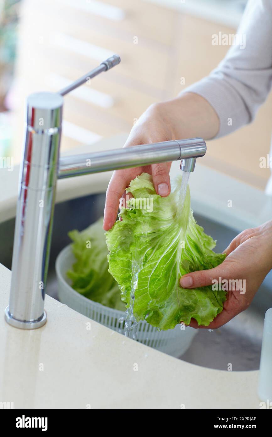 Young couple in kitchen Stock Photo