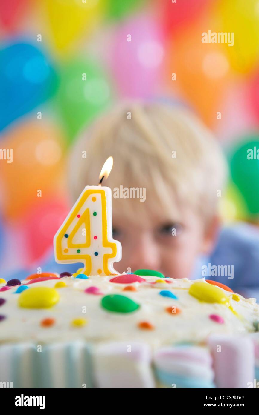 four-year-old-boy-celebrating-his-birthday-stock-photo-alamy