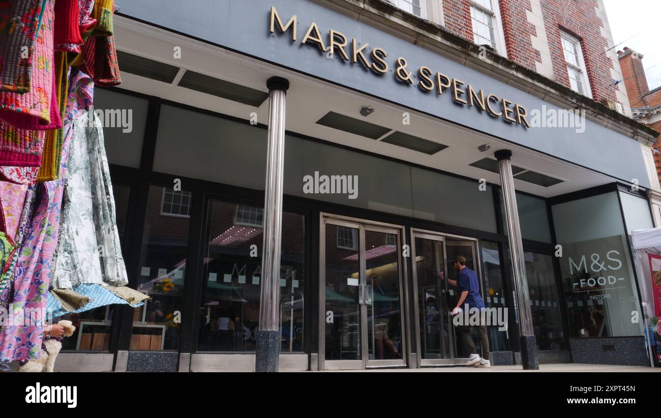 Shops in Winchester high street Stock Photo - Alamy