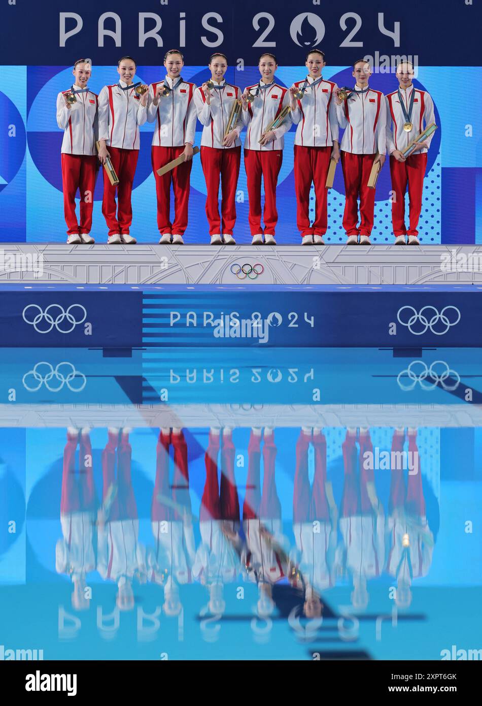 Team China's swimmers celebrate on the podium of the Artistic Swimming ...