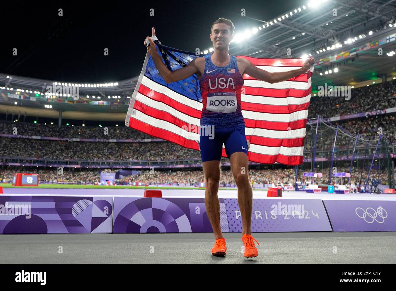Kenneth Rooks, of the United States, poses after winning the silver ...