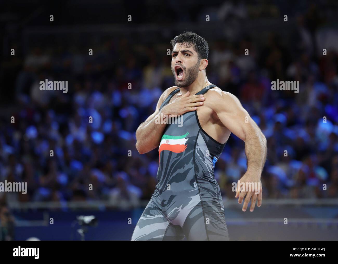 Iran's SARAVI Mohammadhadi reacts after winning the Men's Greco-Roman ...