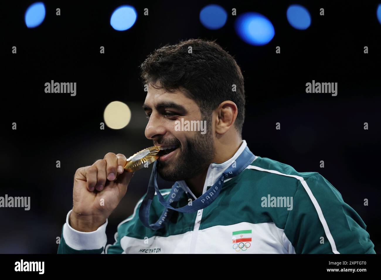 Iran's SARAVI Mohammadhadi poses for a photo after winning the Men's ...