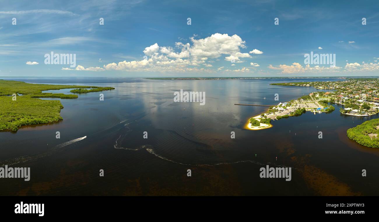 Aerial view of Florida wetlands with green vegetation between ocean ...