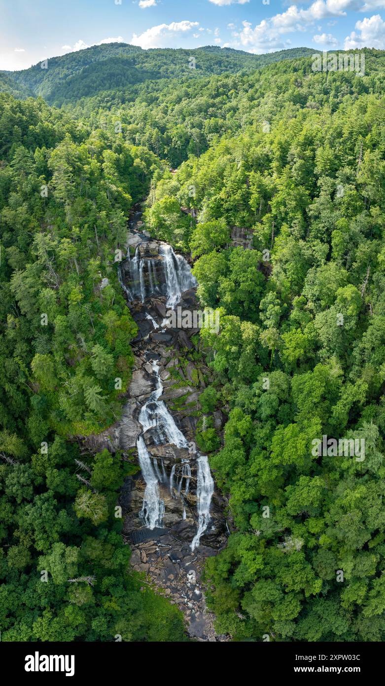 Beautiful landscape of high waterfall with falling down clear water ...