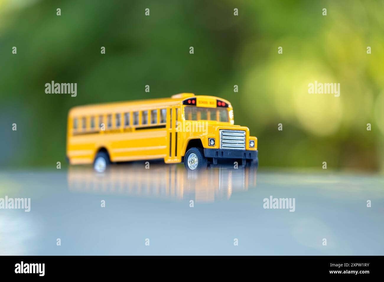 Model of classical american yellow school bus for transporting of kids ...