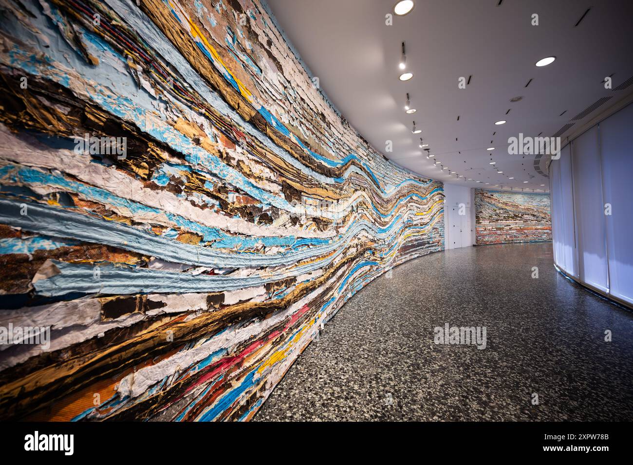 Hirshhorn Museum Pickett’s Charge Installation Washington D.C. // WASHINGTON D.C., United States — Pickett’s Charge by Mark Bradford on display at the Hirshhorn Museum. This large-scale mixed media installation reinterprets the historic Civil War battle through abstract art, combining layers of colored paper and canvas to create a dynamic and thought-provoking piece. Stock Photo