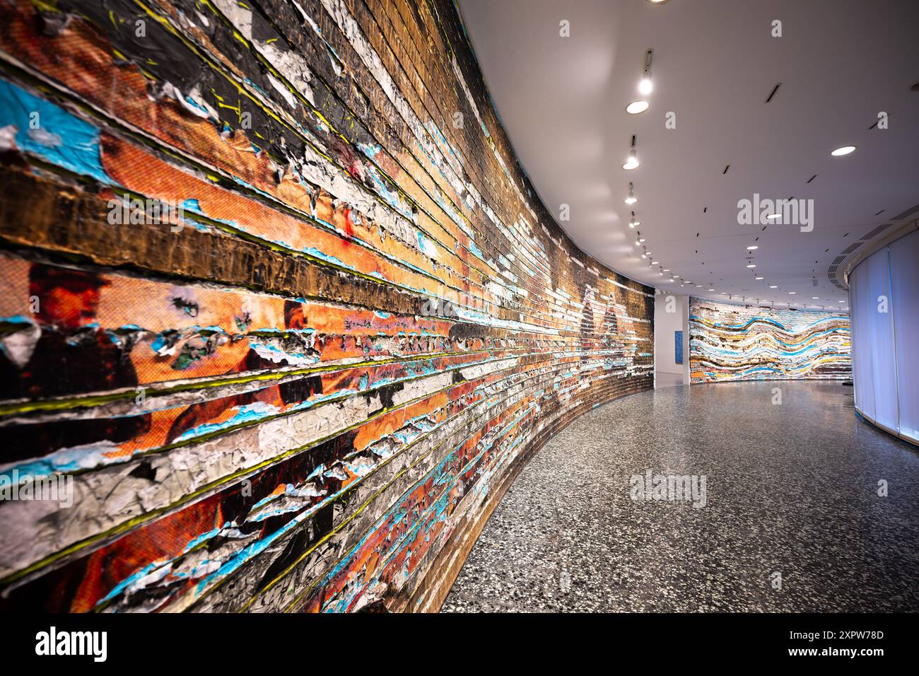 Hirshhorn Museum Pickett’s Charge Installation Washington DC // WASHINGTON D.C., United States — Pickett’s Charge by Mark Bradford on display at the Hirshhorn Museum. This large-scale mixed media installation reinterprets the historic Civil War battle through abstract art, combining layers of colored paper and canvas to create a dynamic and thought-provoking piece. Stock Photo