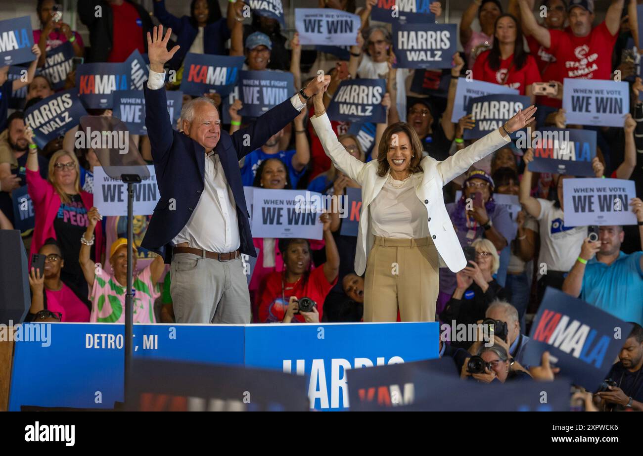 Romulus, United States. 07th Aug, 2024. Minnesota Gov. Tim Walz and Vice President Kamala Harris celebrate on stage during a campaign stop at Signature Aviation Hanger in Romulus, MI on Wednesday August 7, 2024. Photo by Rena Laverty/UPI Credit: UPI/Alamy Live News Stock Photo