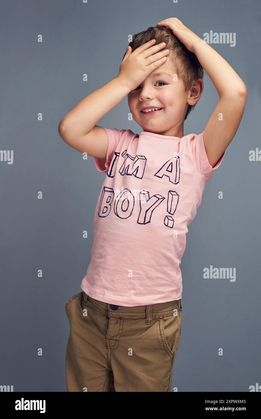 Shy boy standing head hi-res stock photography and images - Alamy