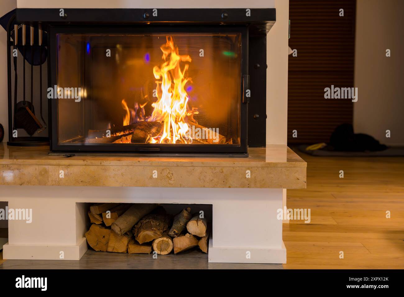 Burning fireplace interior hi-res stock photography and images - Alamy
