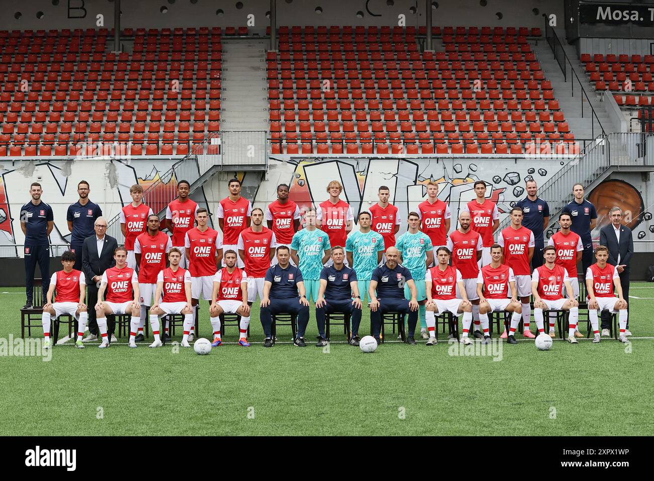 MAASTRICHT, Netherlands, 01-08-2024, football, Dutch Keuken Kampioen Divisie, Stadion de Geusselt, season 2024-2025, last row, left to right: Luke Schiffelers (fysio), Wouter Ganzevles (fysio), Ilano Silva Timas, Saul Penders, Nabil El Basri, Robyn Esajas, Simon Francis, Ilias El Hari, Ferre Slegers, Luca Foubert, Ingmar Cosemans (kit-manager), Bryan Heijnen (clubarts), middle row:John Sliepen (teammanager), Camil Mmaee, Wout Coomans, Ozgur Aktas, Thijs Lambrix, Romain Matthys Joren Op De Beeck, Bryan Smeets, Sven Braken, Ayman Kassimi, Lei Bovens (teammanager) first row: Amine Amgar, Andrea L Stock Photo