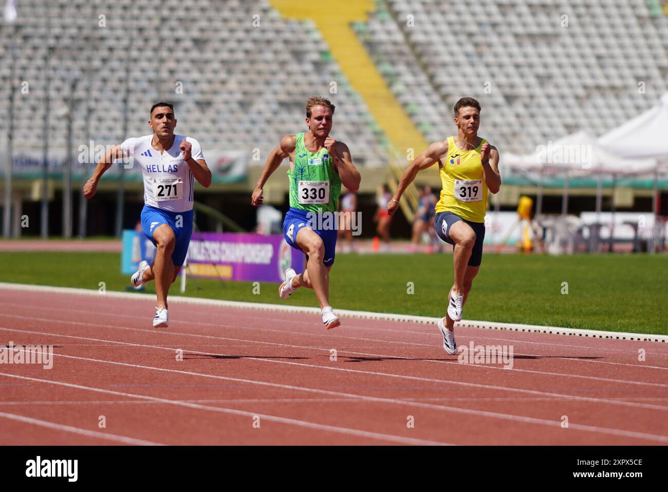 IZMIR, TURKIYE - MAY 25, 2024: Athletes running during Balkan Athletics Championships in Izmir Ataturk Stadium Stock Photo