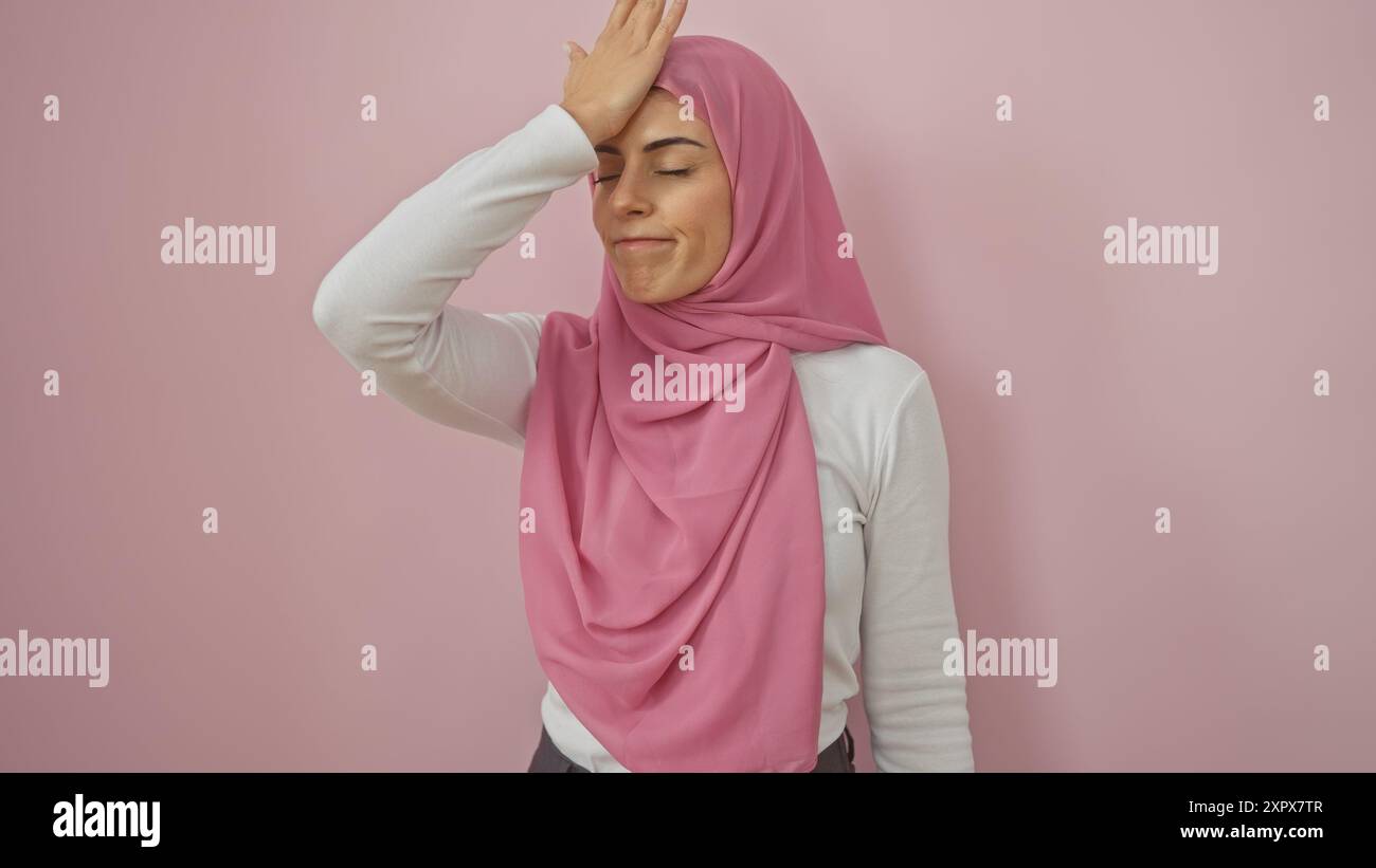 Young woman wearing pink hijab hi-res stock photography and images - Alamy