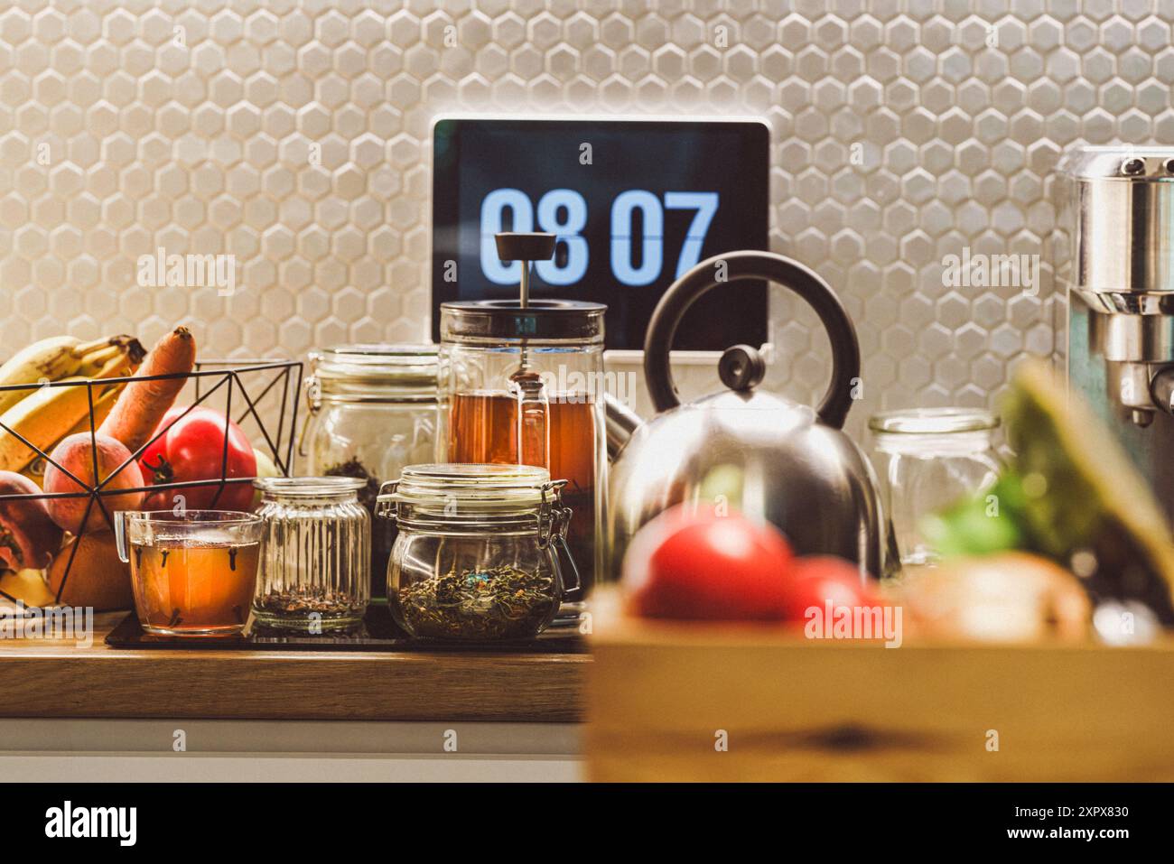 Home kitchen items interior. Tea jars teapots. Smart homet. Touch screen display on wall. Stock Photo