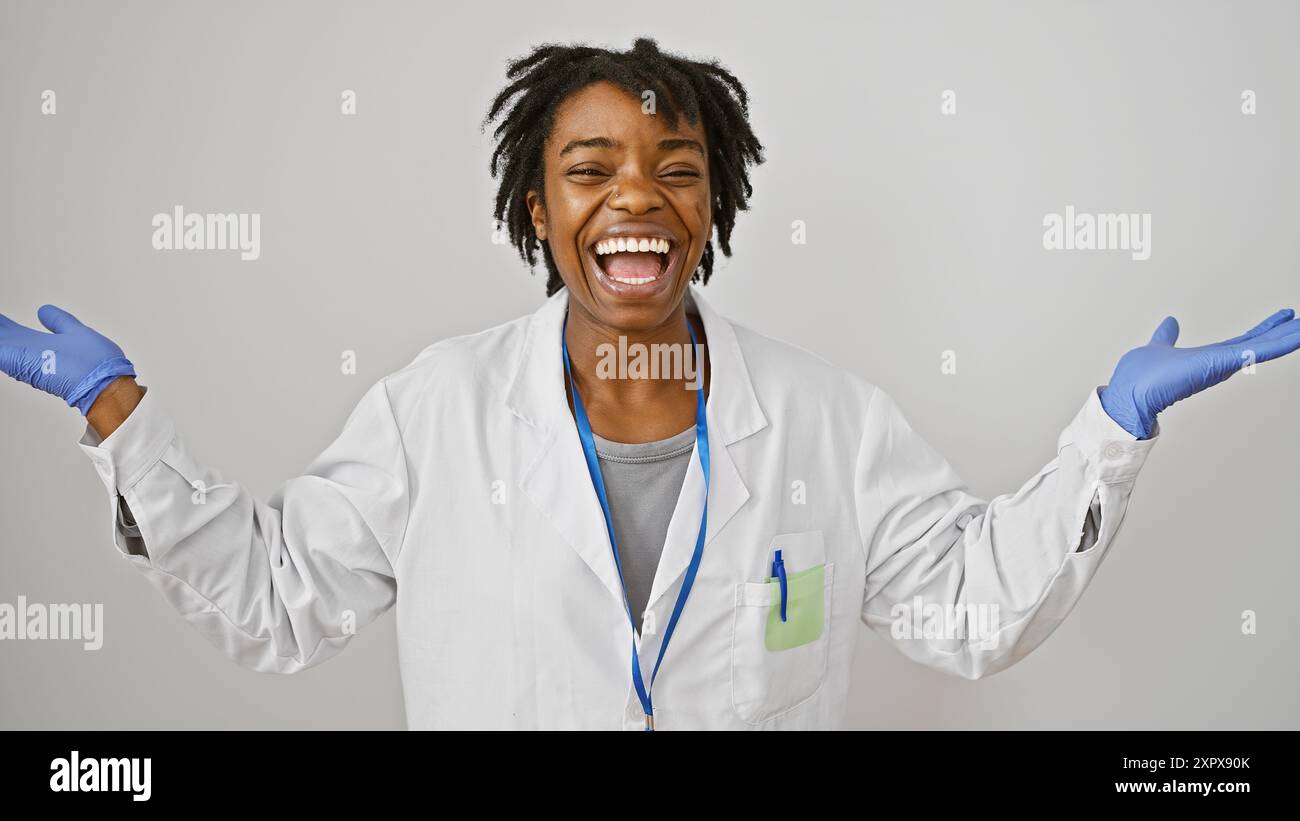 Joyful african woman scientist in lab coat and gloves celebrates ...