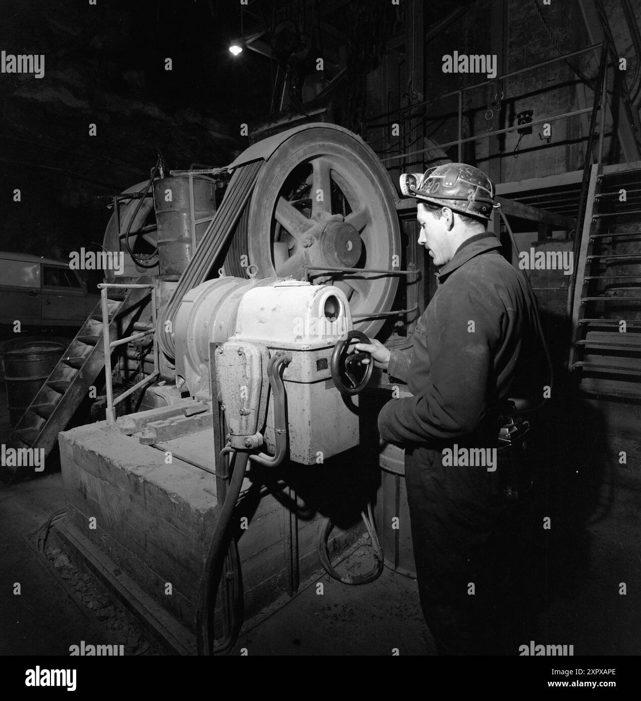 Current 20-9-1968 : Mining during avalanches.On Stjernøya there is a quarry for nephelin syelite. Nepheline syelite consists of feldspar and nepheline, and is mainly used in the glass and porcelain industry. The mining company occasionally triggers controlled landslides to prevent avalanches.  Photo: Sverre A. Børretzen / Aktuell / NTB ***PHOTO NOT IMAGE PROCESSED***    This image is auto translated    This image is auto translated Stock Photo