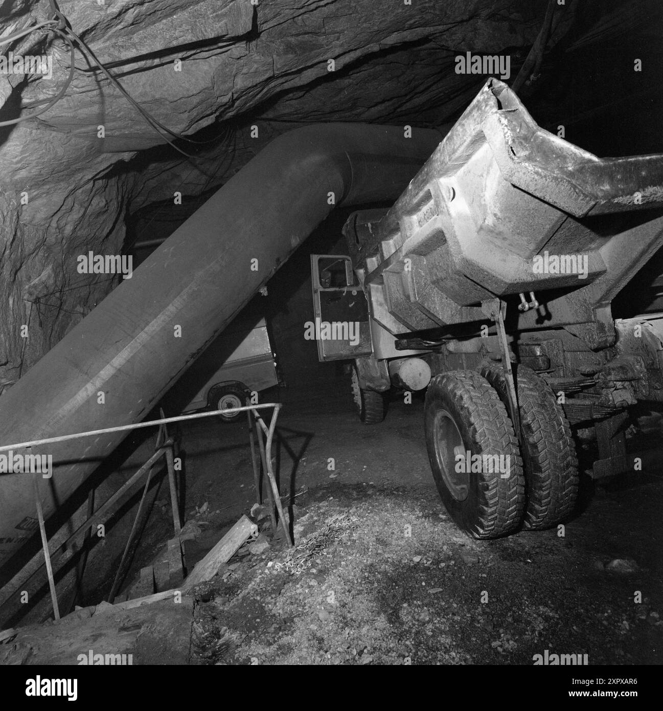 Current 20-9-1968 : Mining during avalanches.On Stjernøya there is a quarry for nephelin syelite. Nepheline syelite consists of feldspar and nepheline, and is mainly used in the glass and porcelain industry. The mining company occasionally triggers controlled landslides to prevent avalanches.  Photo: Sverre A. Børretzen / Aktuell / NTB ***PHOTO NOT IMAGE PROCESSED***    This image is auto translated    This image is auto translated Stock Photo