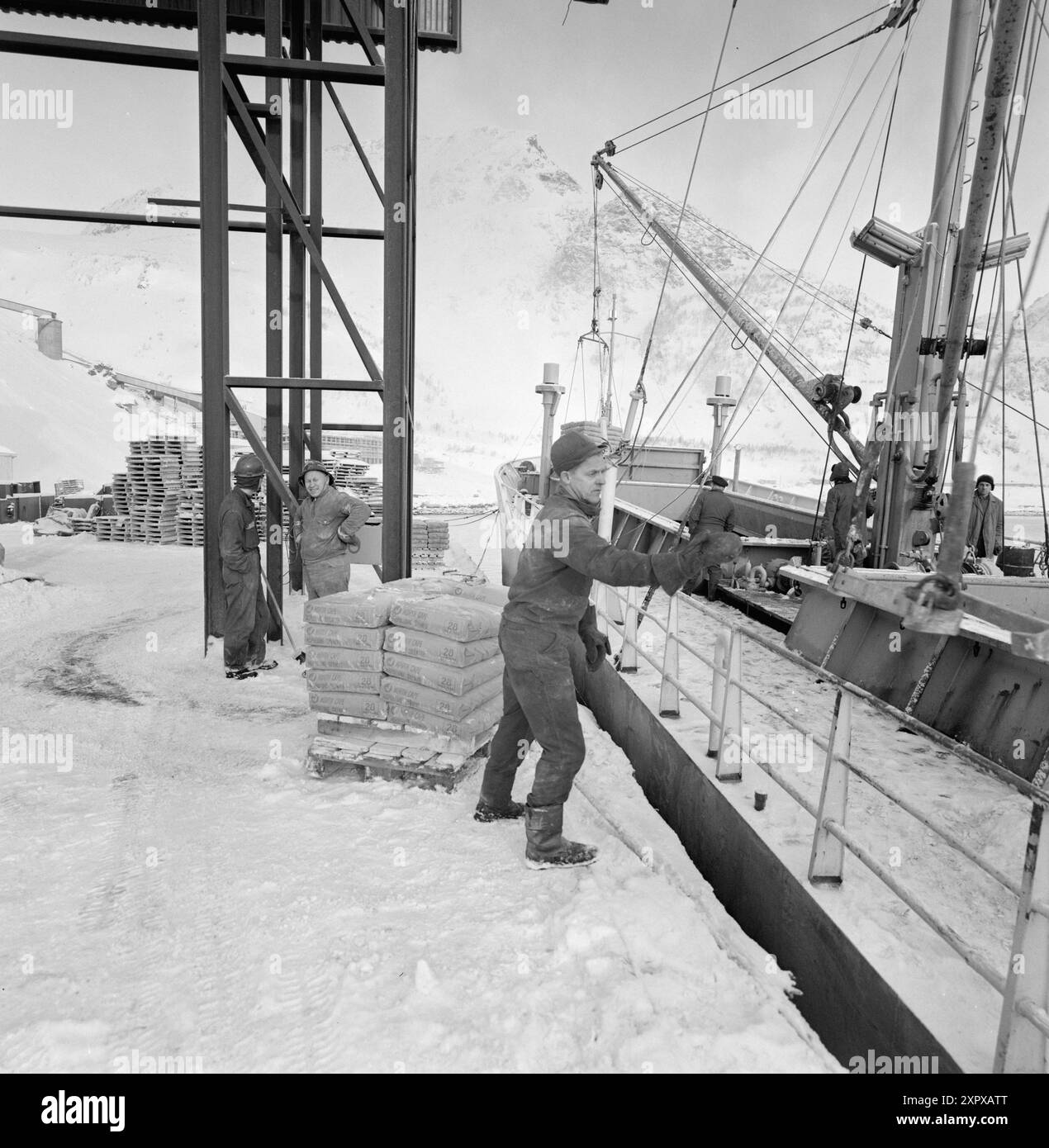 Current 20-9-1968 : Mining during avalanches.On Stjernøya there is a quarry for nephelin syelite. Nepheline syelite consists of feldspar and nepheline, and is mainly used in the glass and porcelain industry. The mining company occasionally triggers controlled landslides to prevent avalanches.  Photo: Sverre A. Børretzen / Aktuell / NTB ***PHOTO NOT IMAGE PROCESSED***    This image is auto translated    This image is auto translated Stock Photo