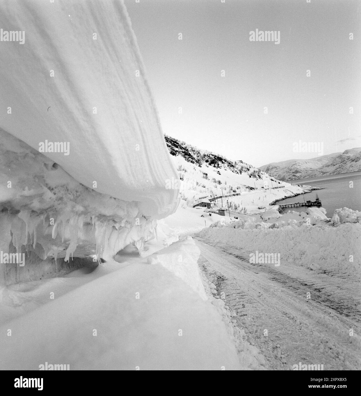 Current 20-9-1968 : Mining during avalanches.On Stjernøya there is a quarry for nephelin syelite. Nepheline syelite consists of feldspar and nepheline, and is mainly used in the glass and porcelain industry. The mining company occasionally triggers controlled landslides to prevent avalanches.  Photo: Sverre A. Børretzen / Aktuell / NTB ***PHOTO NOT IMAGE PROCESSED***    This image is auto translated    This image is auto translated Stock Photo