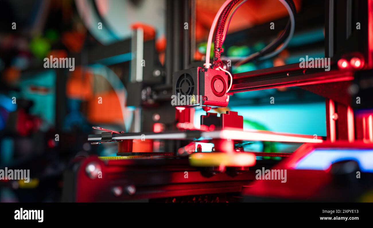 3D printer preparing object. Production prototype. Nozzle clese-up. Stock Photo