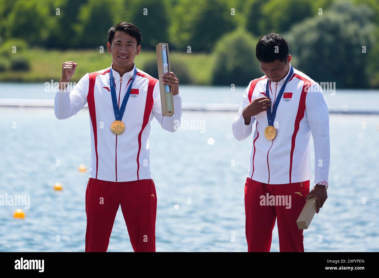 Gold medalists China's Ji Bowen and Liu Hao celebrate during a medals ...