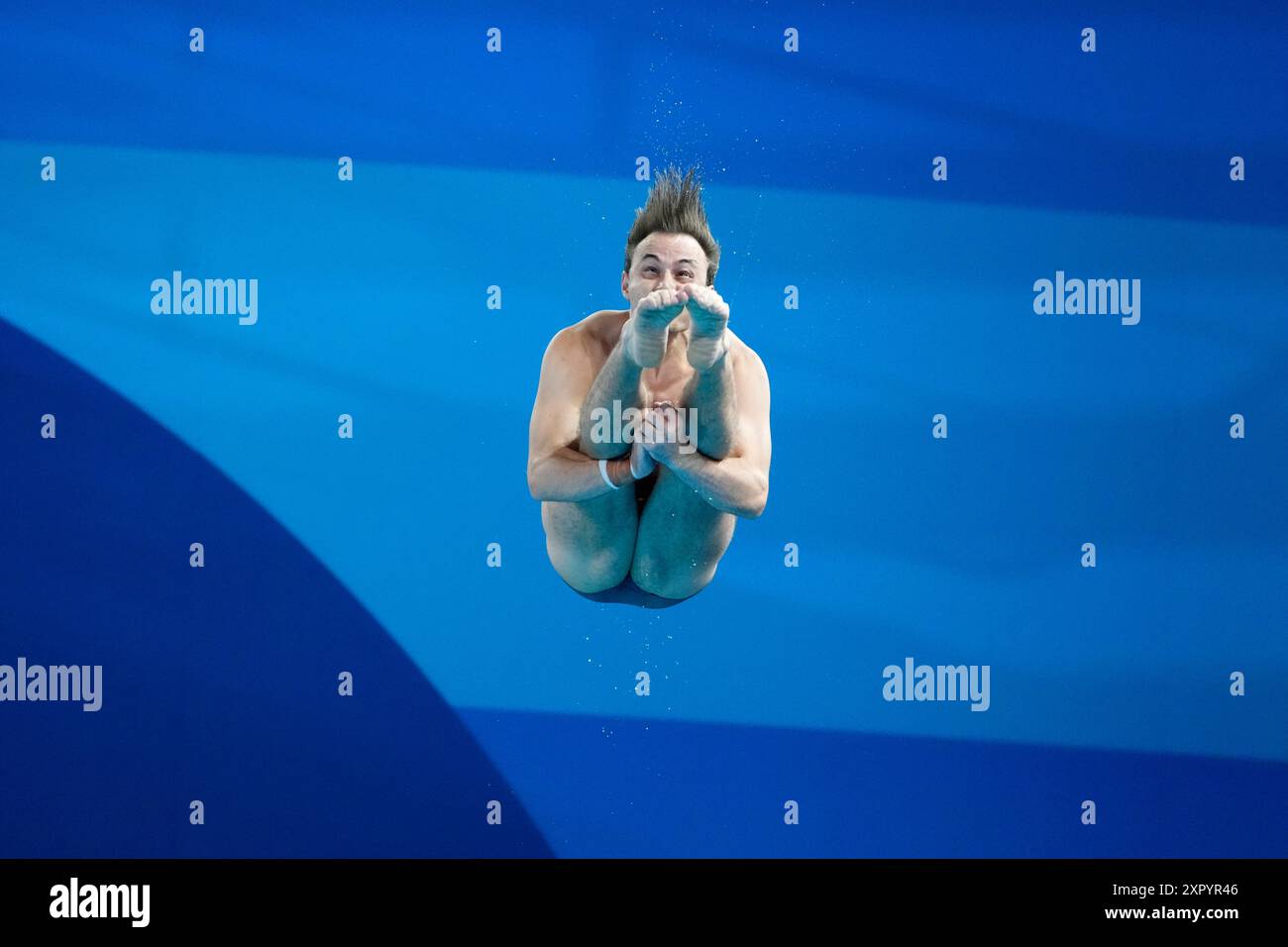 Australia's Kurtis Mathews competes in the men's 3m springboard diving