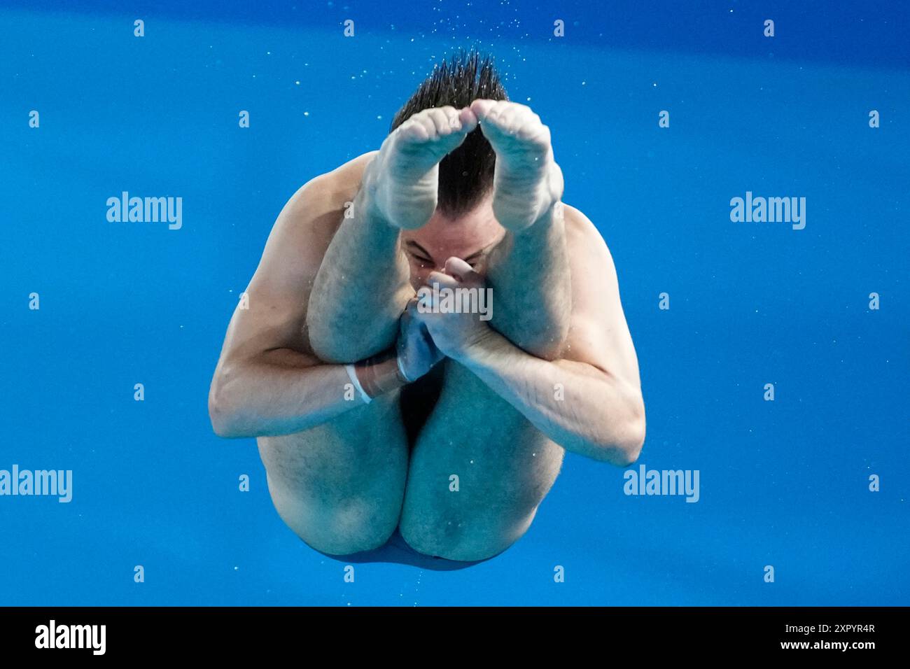 Australia's Kurtis Mathews competes in the men's 3m springboard diving