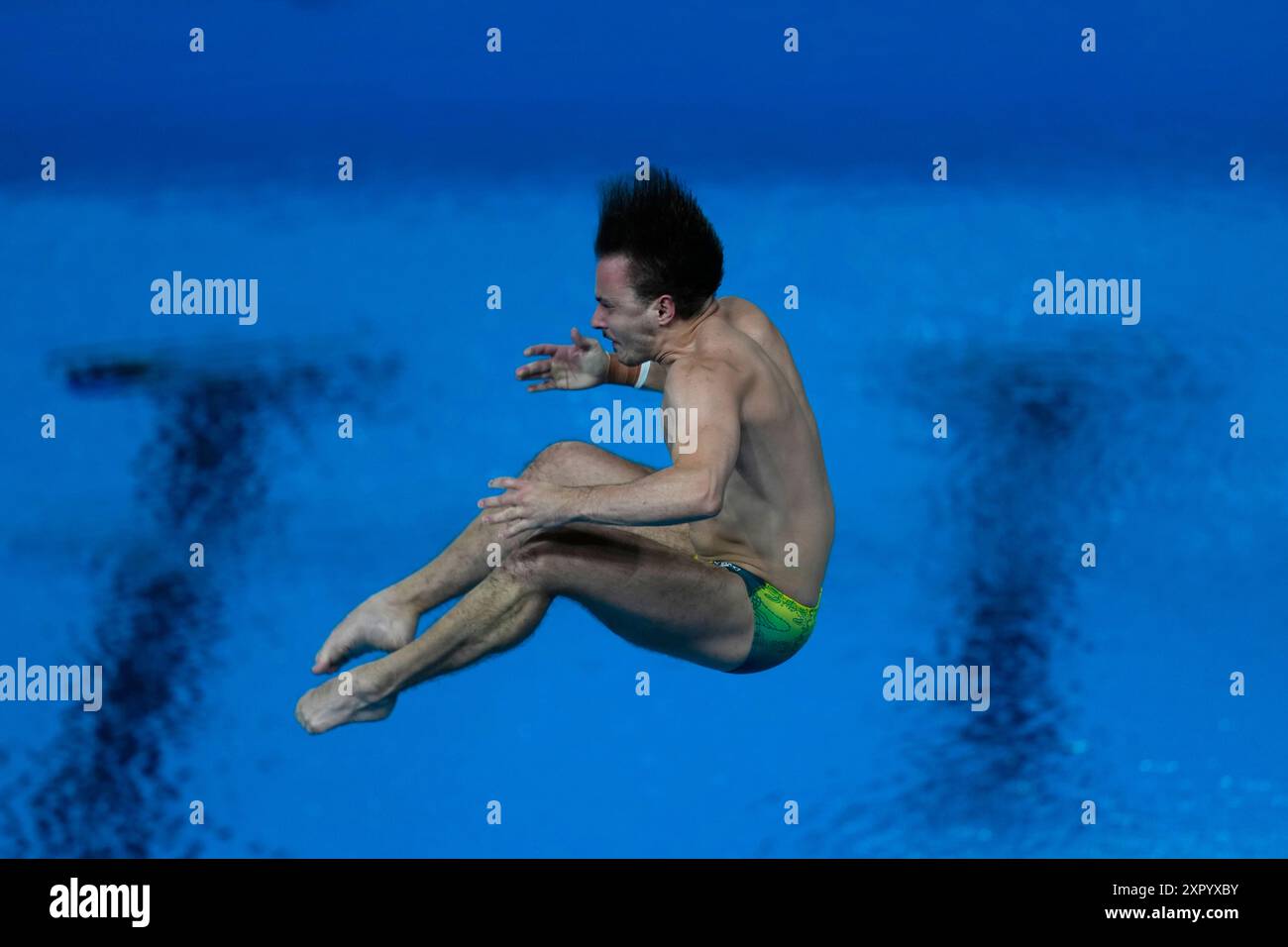 Australia's Kurtis Mathews competes in the men's 3m springboard diving