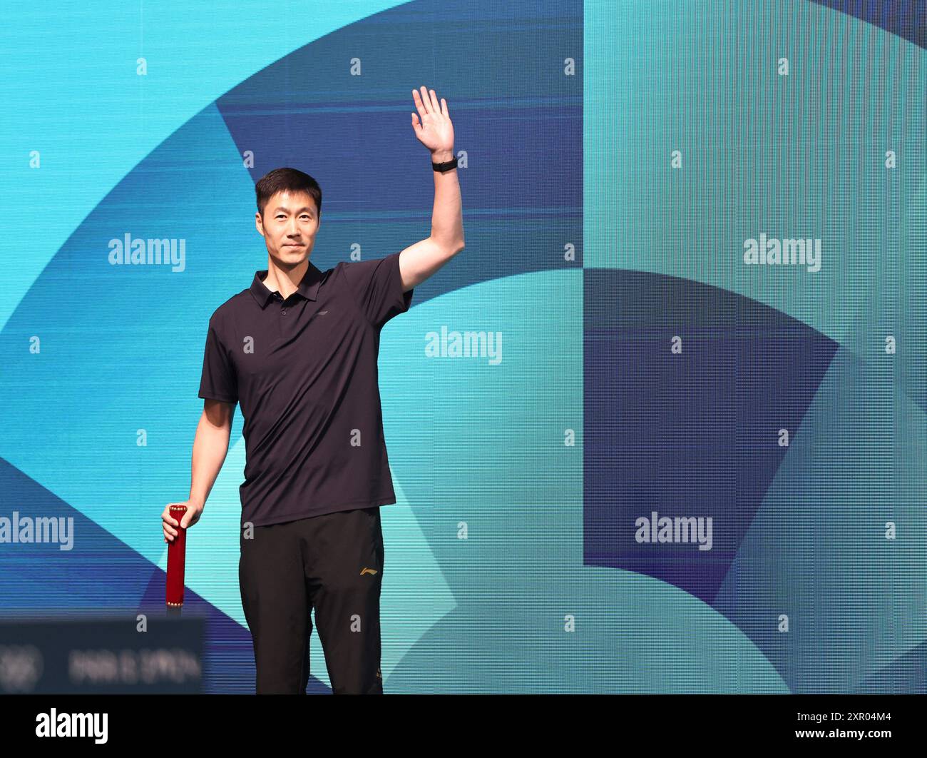 Paris, France. 8th Aug, 2024. China's former table tennis Olympic champion Wang Liqin is seen before the men's team semifinal of table tennis between China and France at the Paris 2024 Olympic Games in Paris, France, on Aug. 8, 2024. Credit: Wang Dongzhen/Xinhua/Alamy Live News Stock Photo