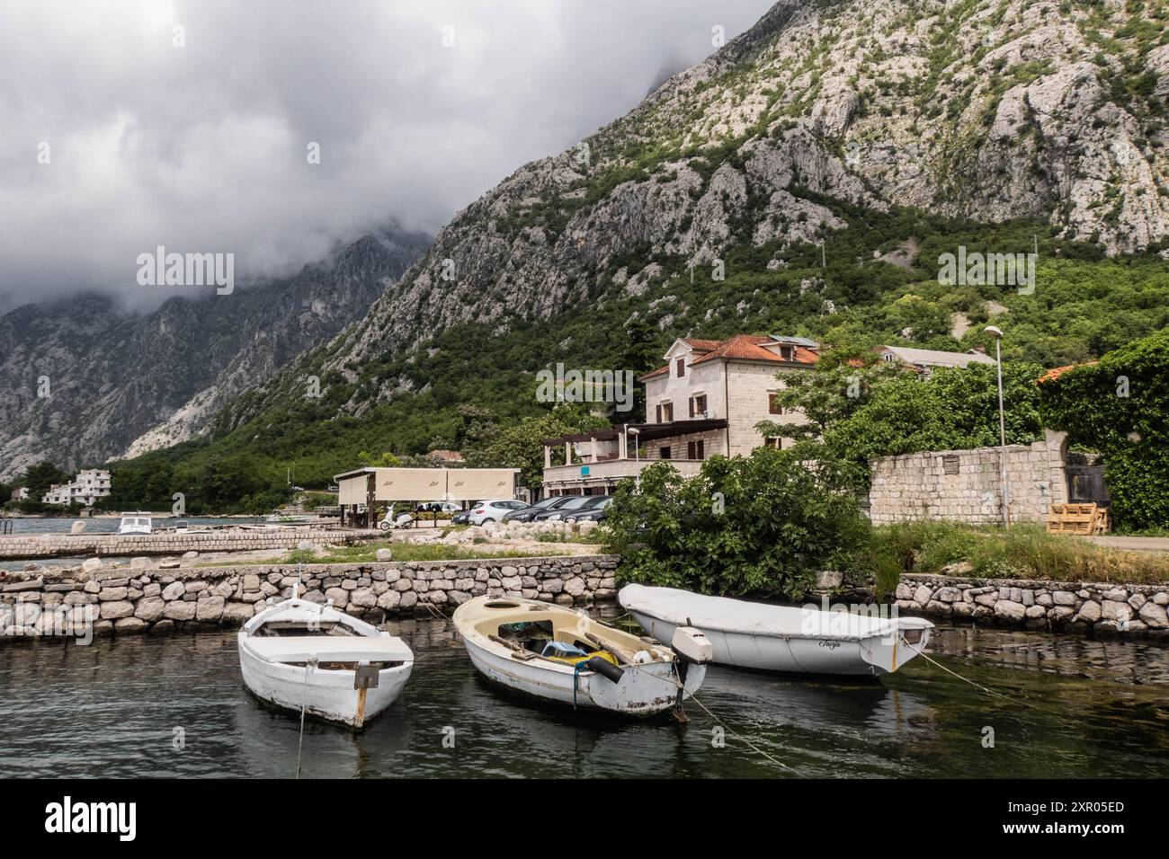 Boats in the UNESCO Bay of Kotor, Kotor, Montenegro Stock Photo