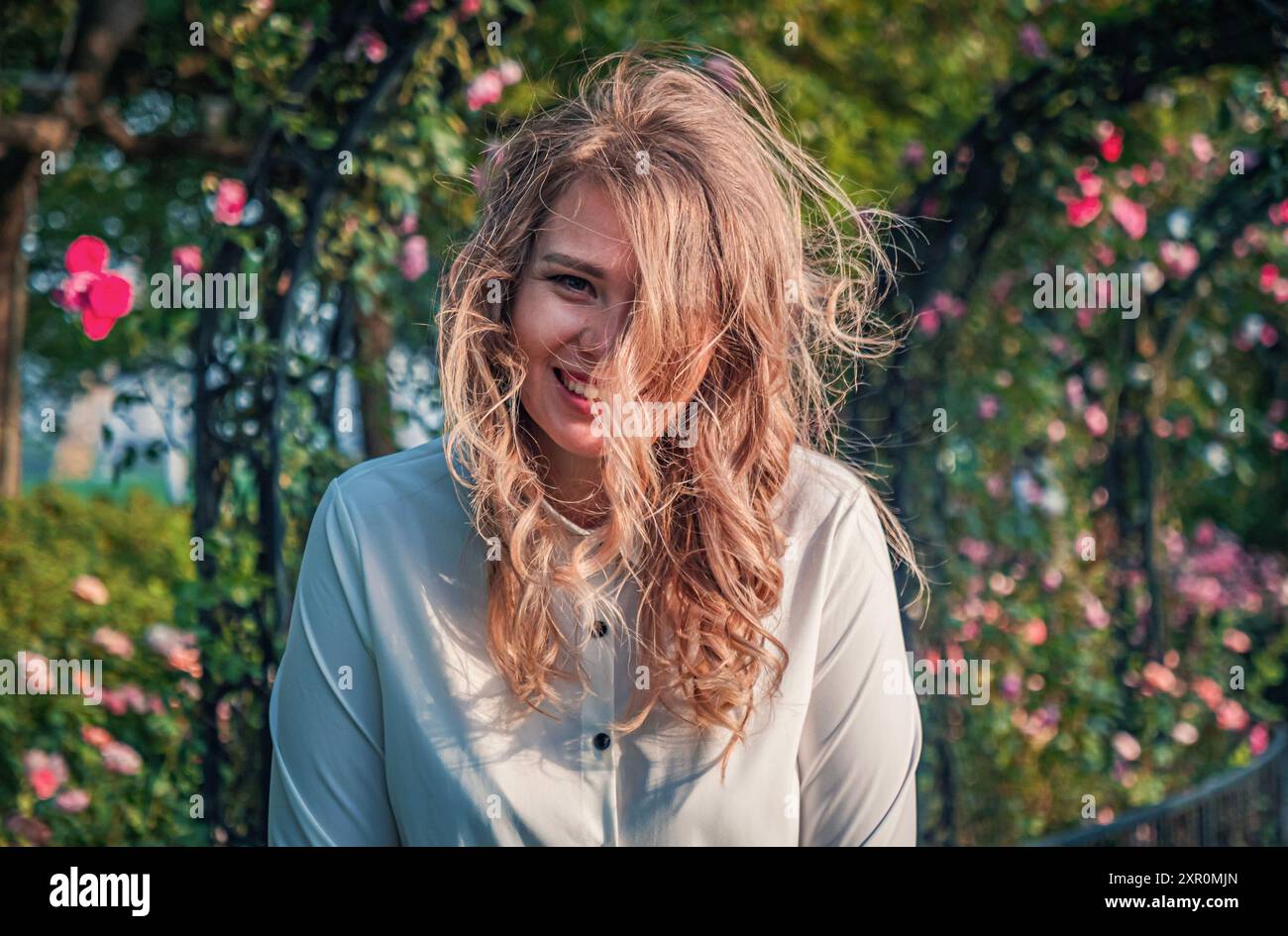 Curly hair woman smiling hi-res stock photography and images - Alamy