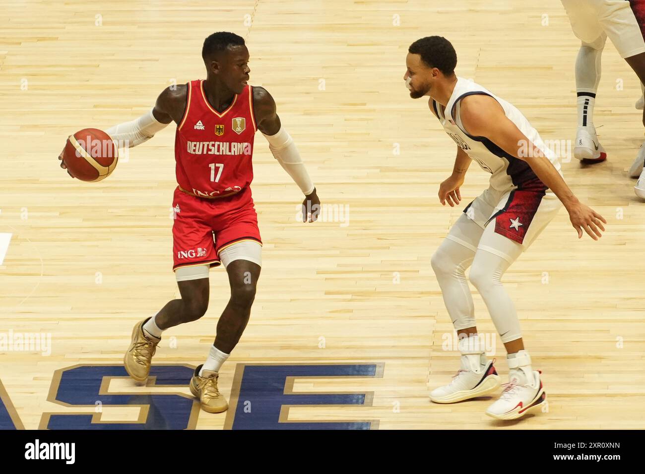 Dennis Schröder of Germany and Stephen Curry of USA during the