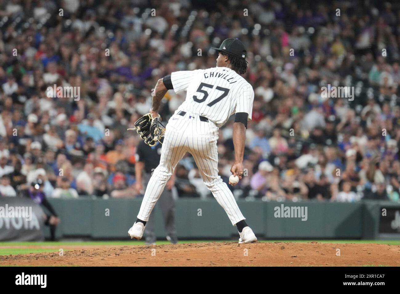 angel August 7 2024: Colorado pitcher Angel Chivilli (57) throws a ...