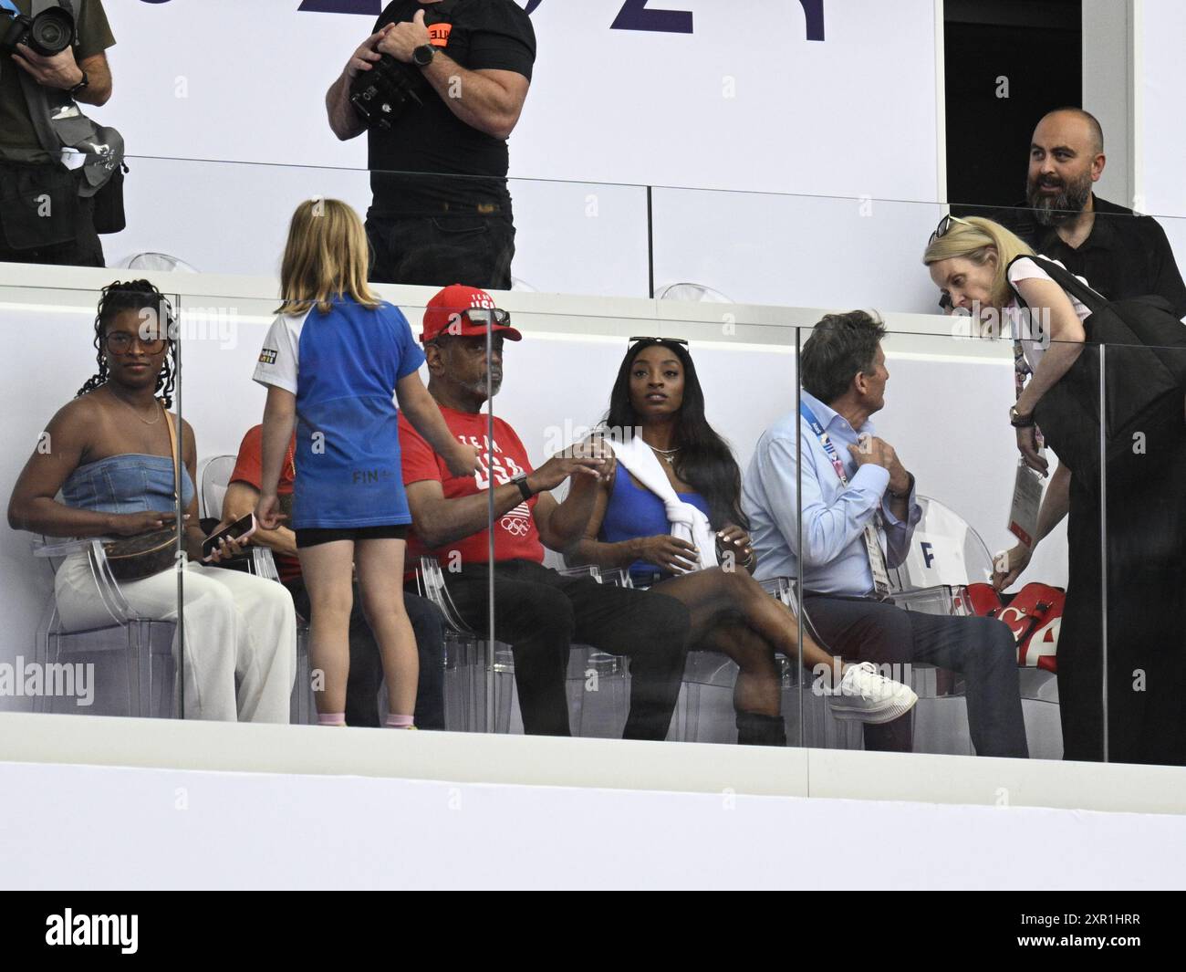 US gymnast Simone Biles and her parents pictured in the stands at the