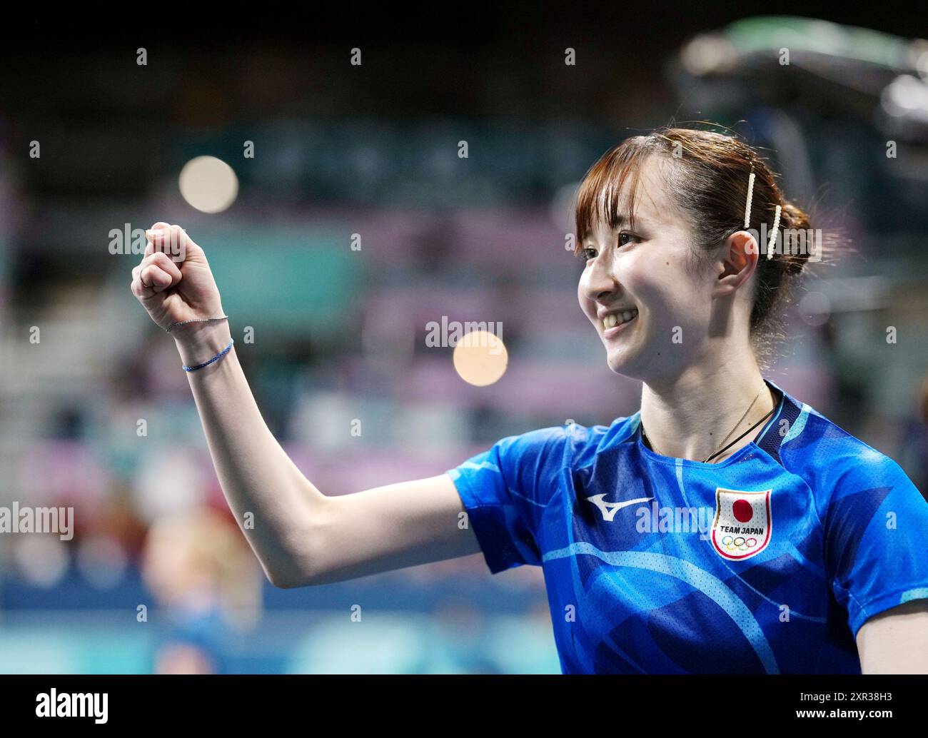 Japan's Hina Hayata smiles after beating Germany in the first match of ...