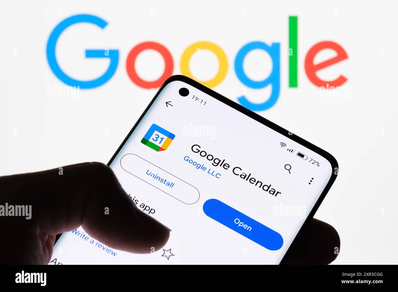 Close up of a smartphone screen displaying Google Calendar app with