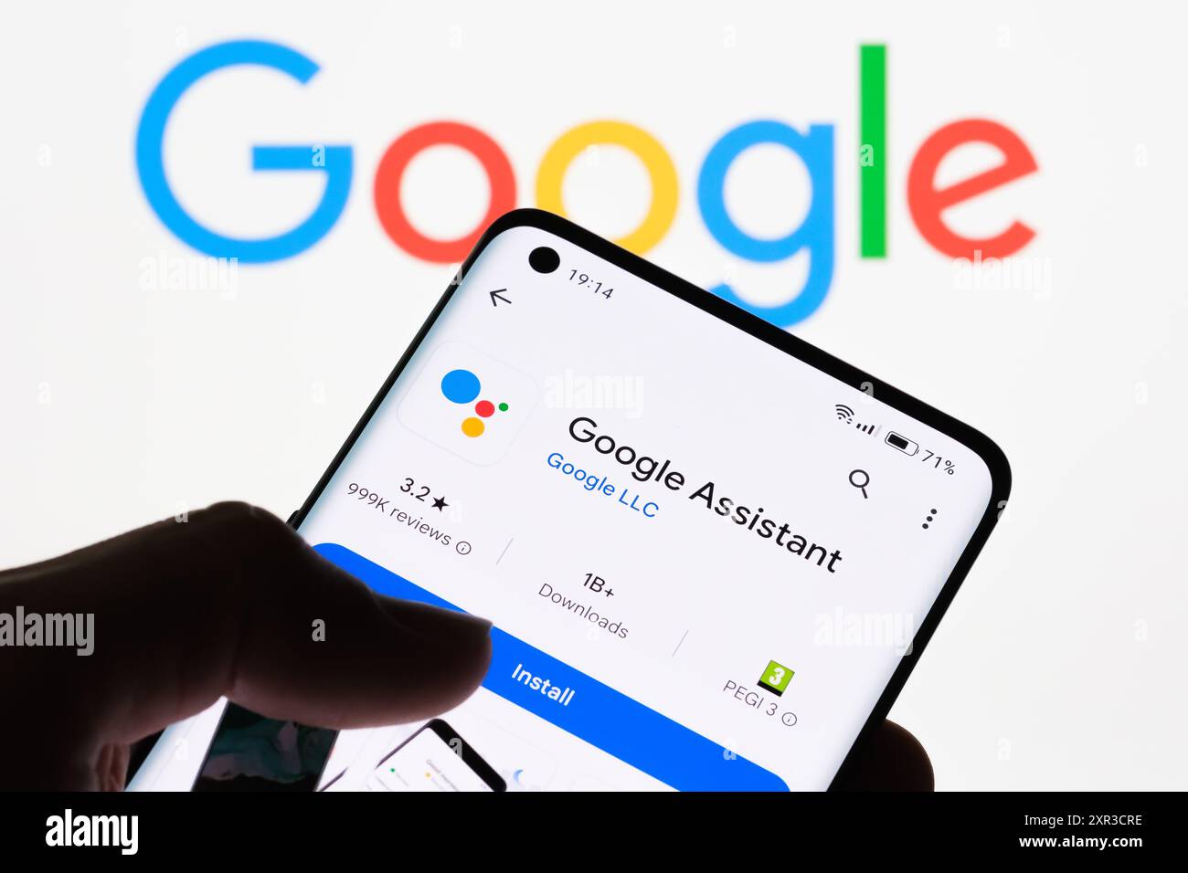 Close-up of a smartphone screen displaying Google Assistant app with ...