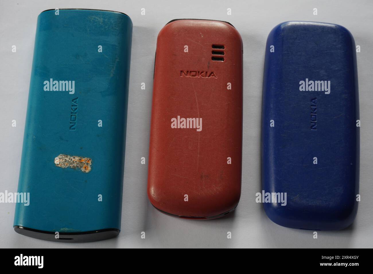 Terengganu, Malaysia - 24 August 2024 : Closeup of various nokia keypad phones on isolated background. Back panel nokia keypad phones. Stock Photo
